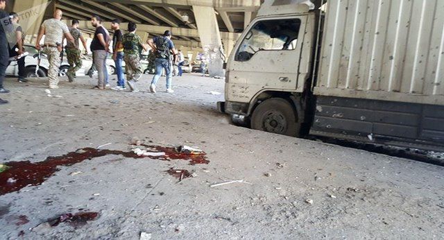 15 قتيلا بهجوم لأربعة انتحاريين على مركز شرطة في العاصمة السورية